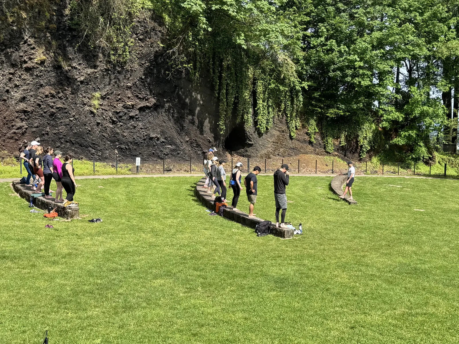 A No Easy Feet class balancing along the cement blocks at Mt. Tabor Park in SE Portland